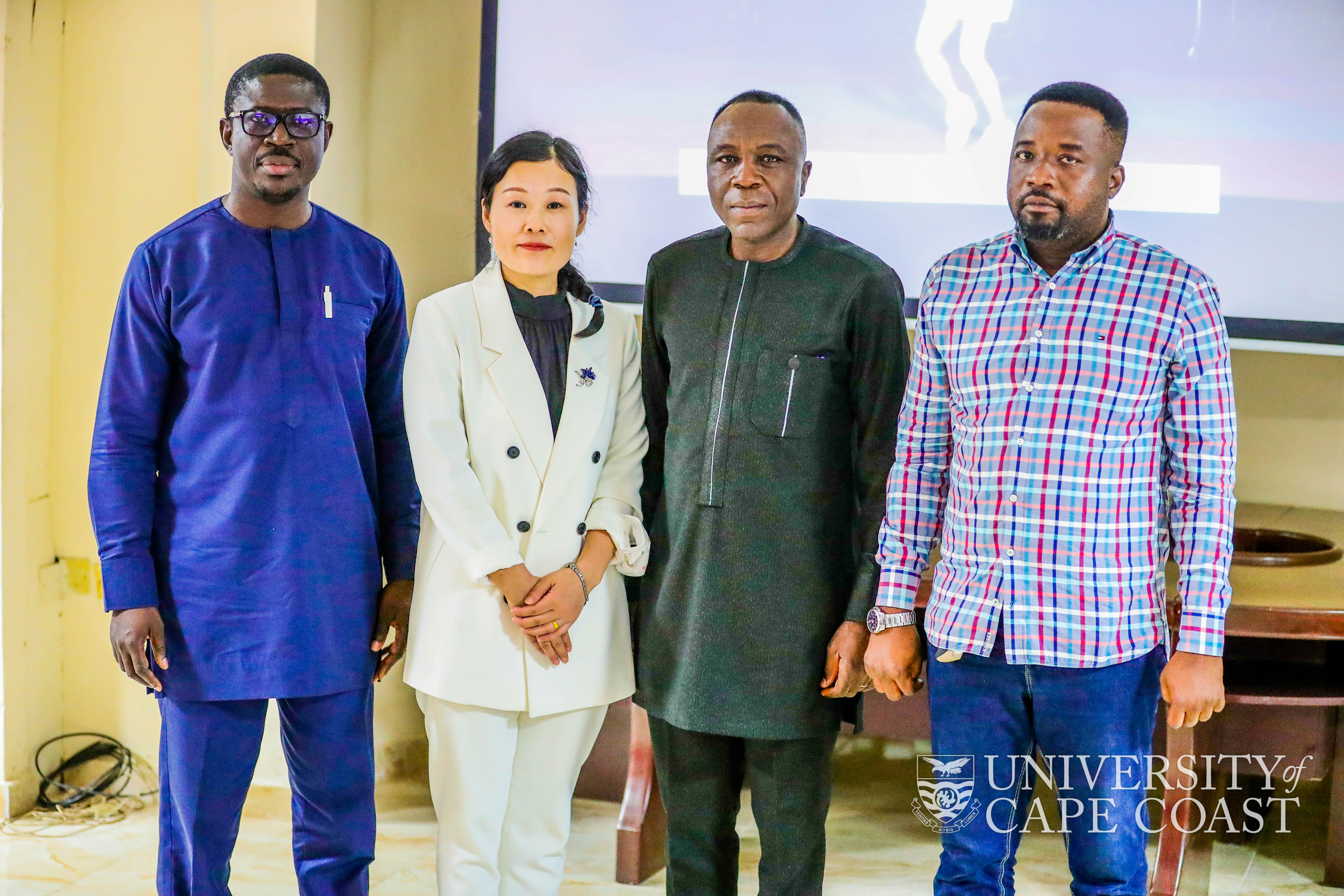 Mr. Divine Yao Ayidzoe (2nd right) in a photo with Chinese Director of UCC Confucius Institute, Prof. OU Yamei (2nd left) and Ghana Director of UCC Confucius Institute, Prof. Ishmael Mensah (left