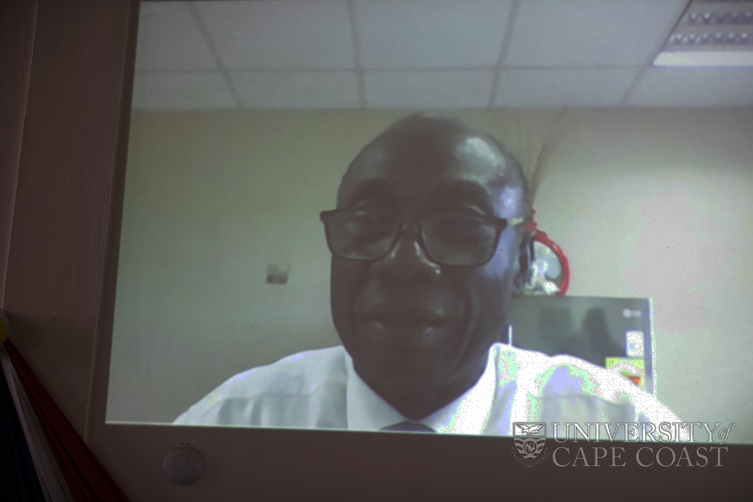 Dr. Kwabena Donkor speaking via virtual at the lecture