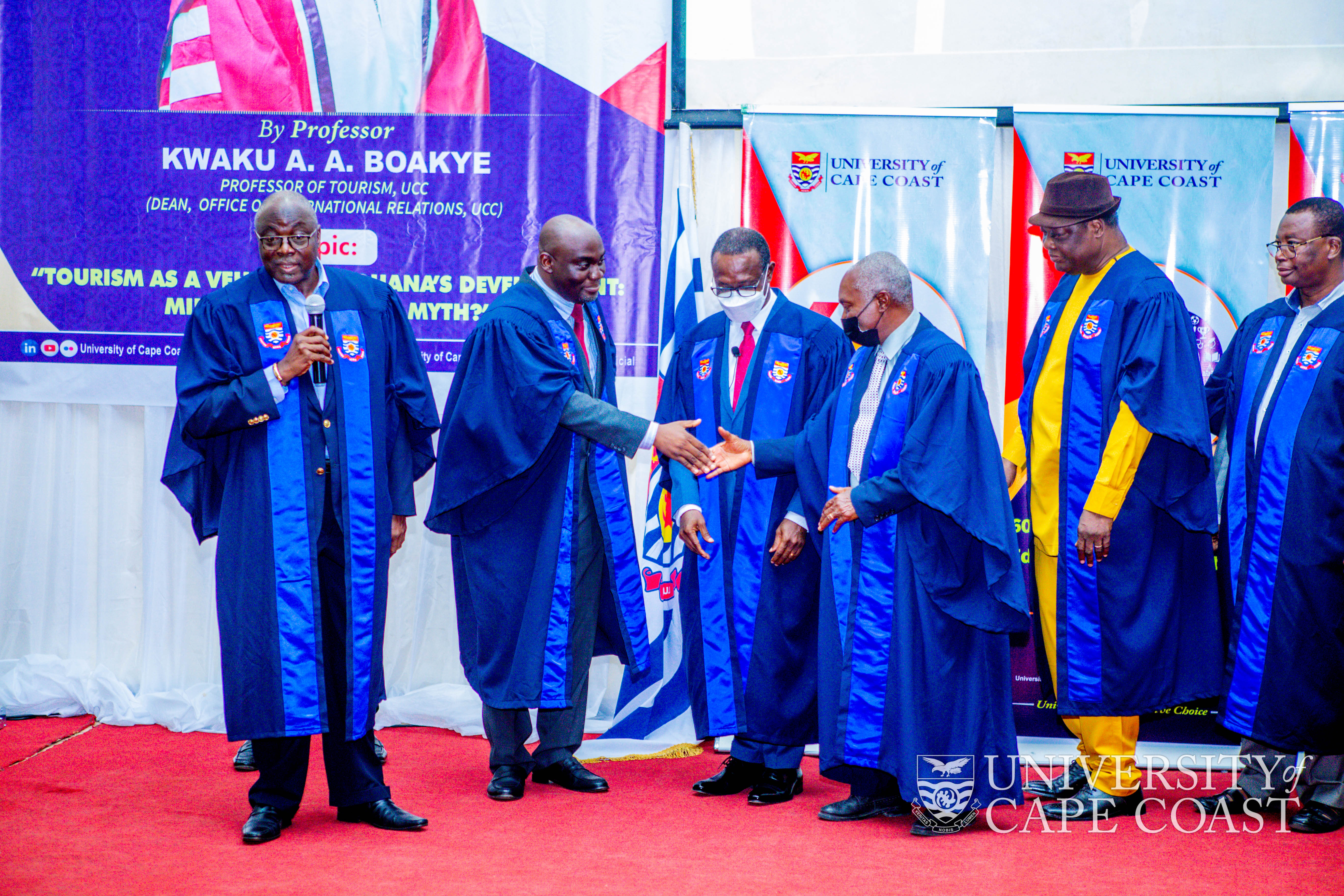 Prof. Boakye being congratulated by the College of Professors-UCC after being robed