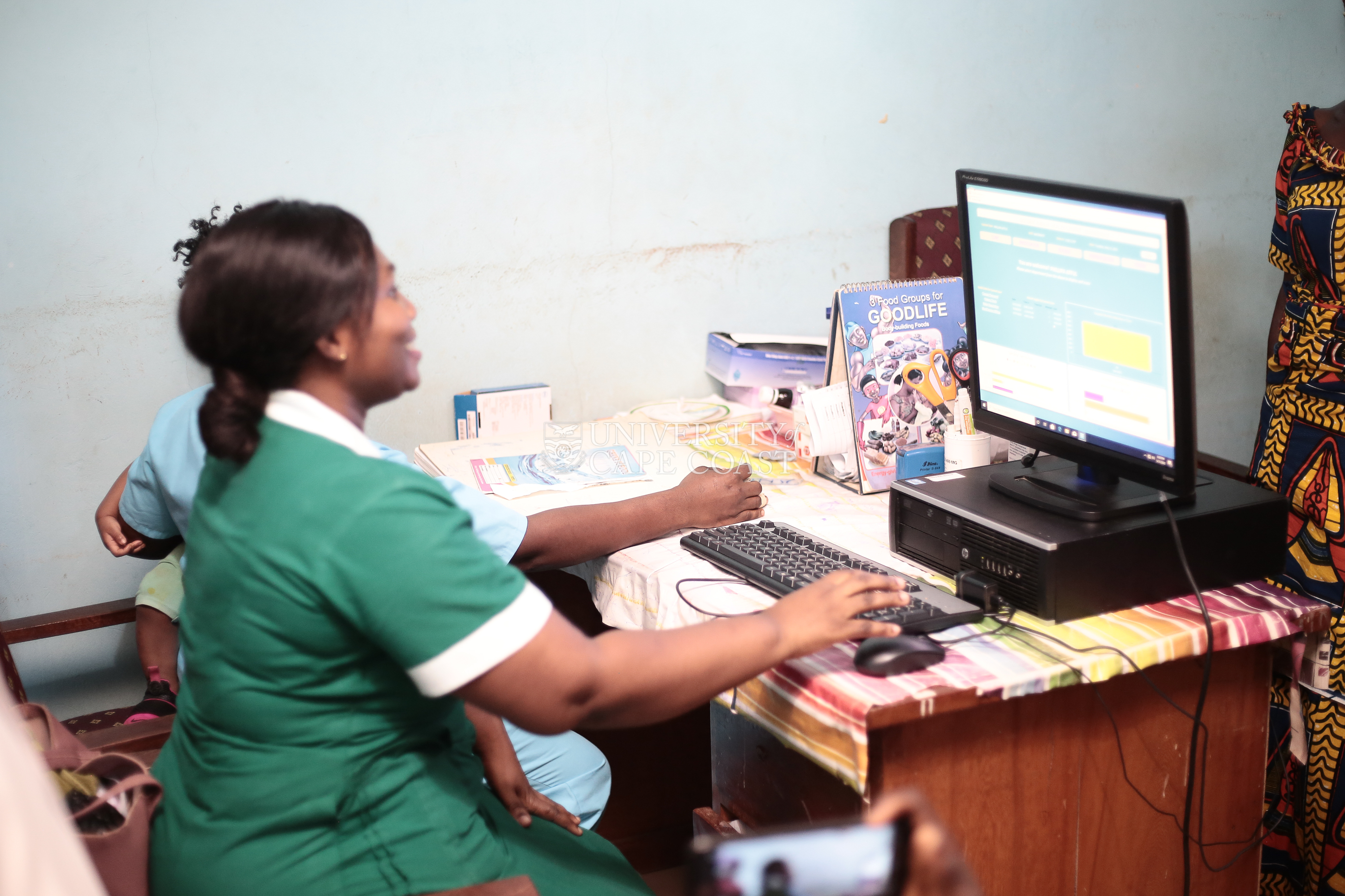 A nurse at the facility demonstrating how the e-Health System operates