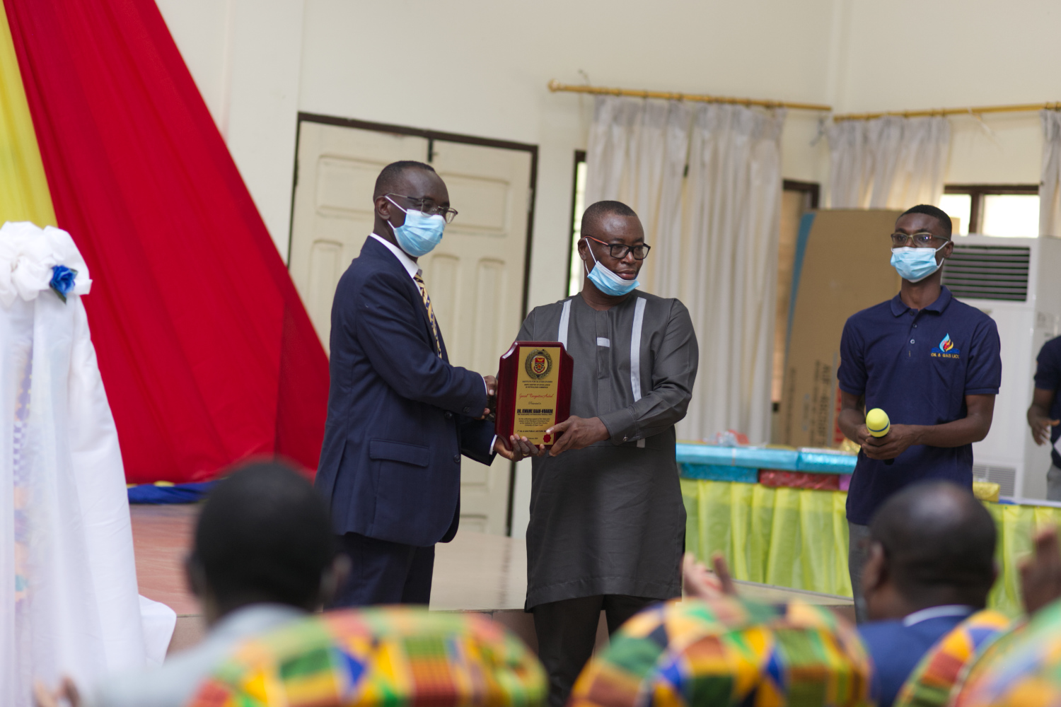   One of the post graduate students, Dr. Kwame Baah-Nuakoh, receiving his award.