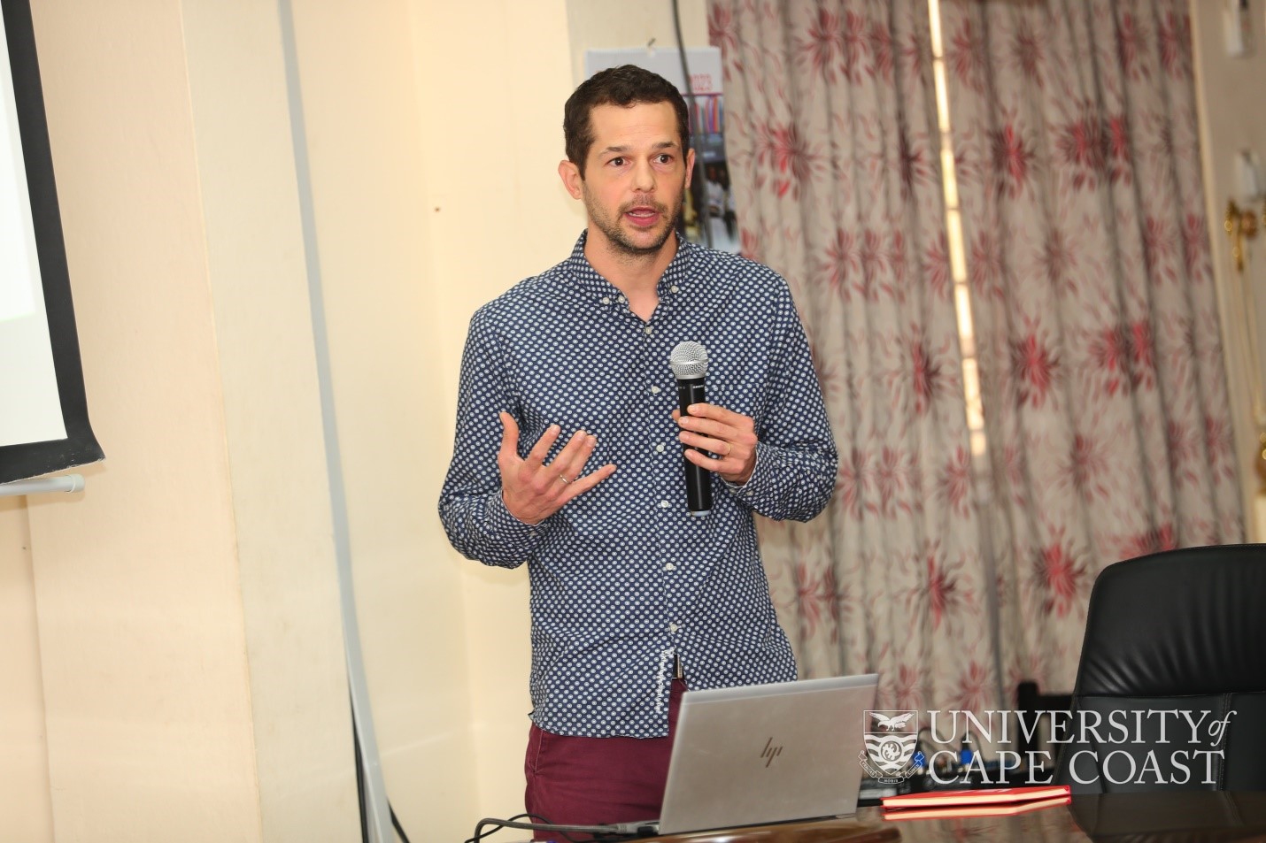 Prof. Chad Bada speaking at the lectureP