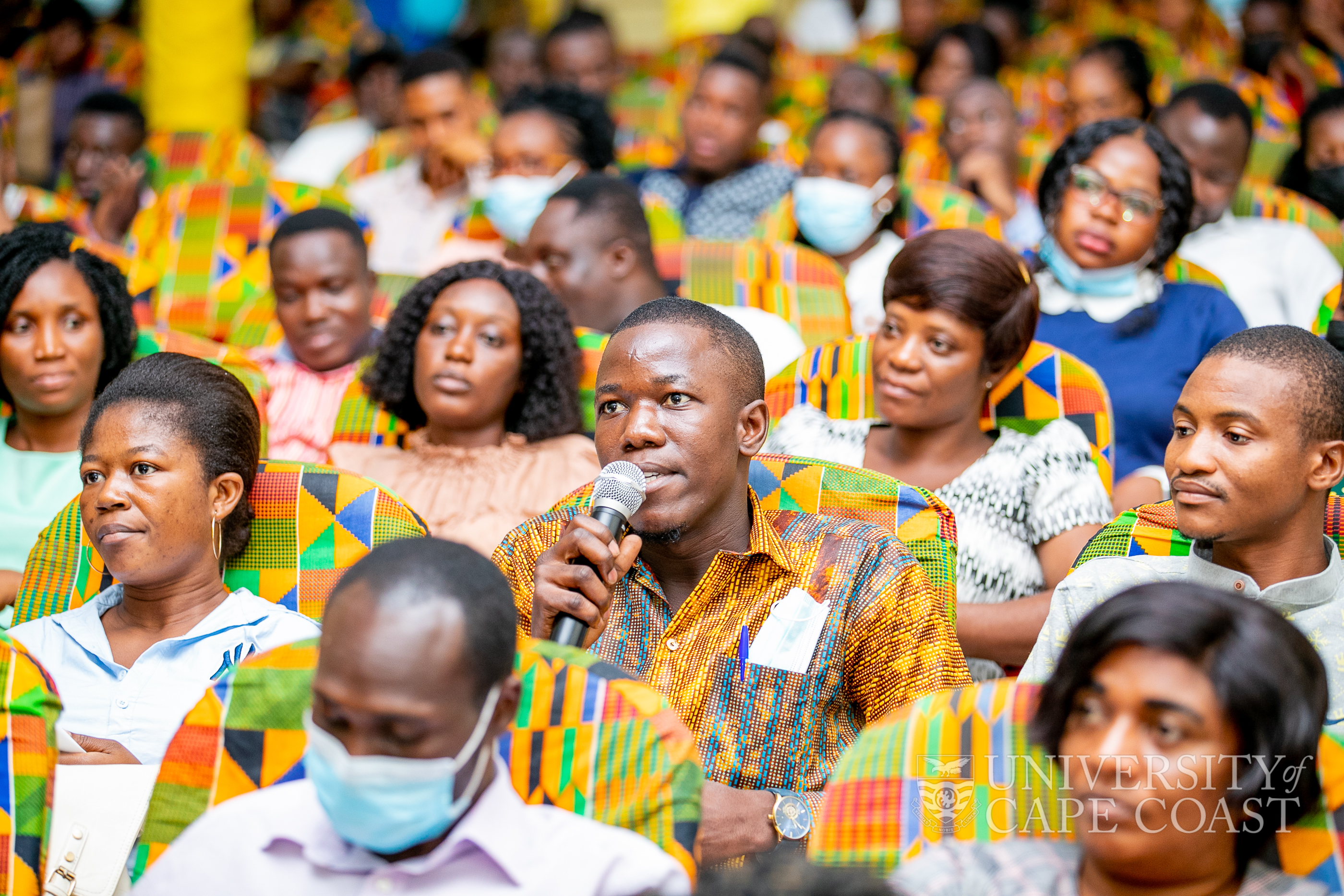 A participant in the workshop asking a question