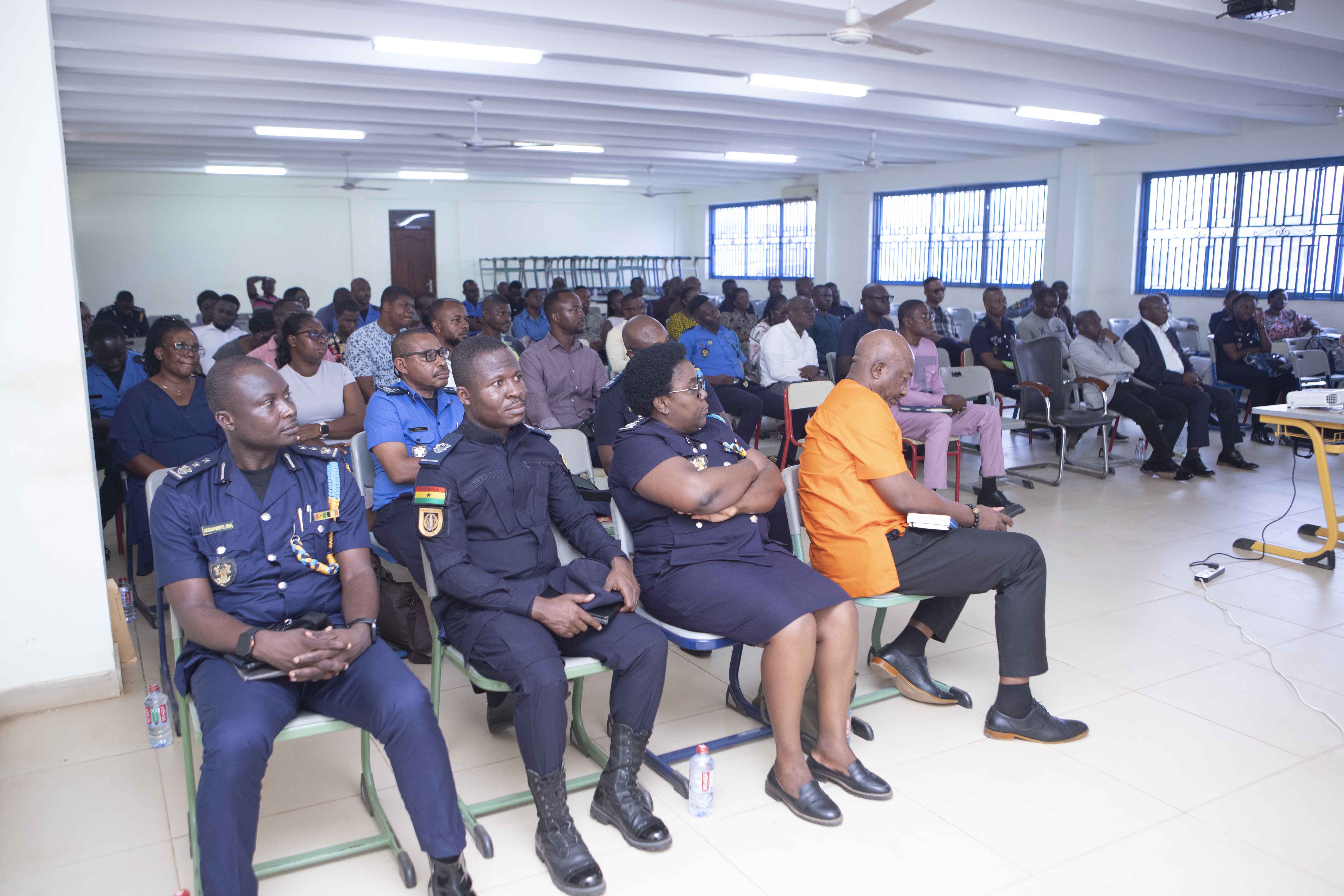 Students listening to the presentations at the event