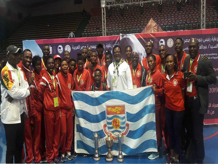 The UCC athletes and officials in a jubilation mood