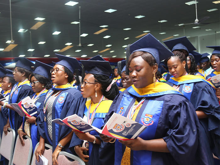 Graduating Students singing the UCC anthem