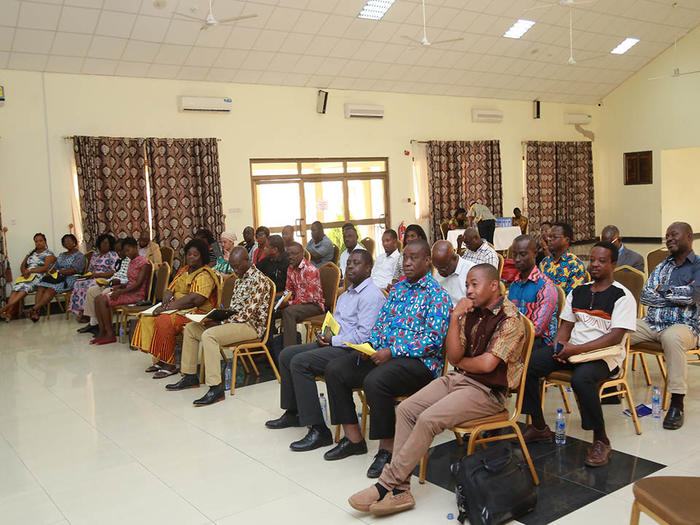 Participants listening to presentations at the workshop