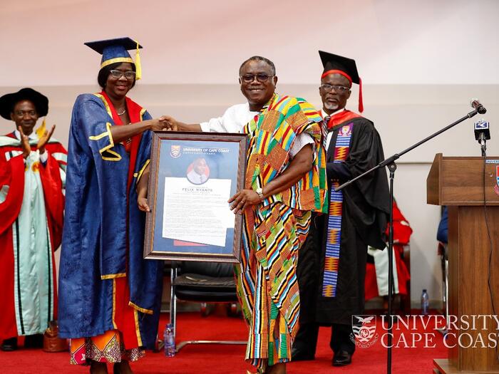 Mr. Felix Nyante receiving a citation from the Pro Vice-Chancellor