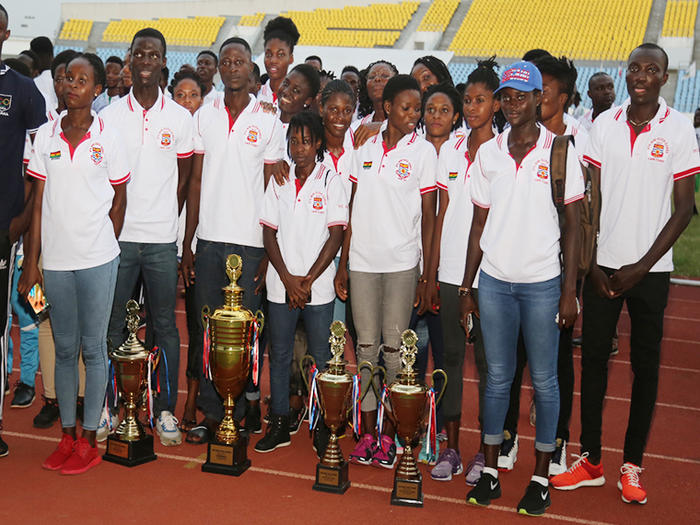 UCC team with trophies won at the 8th Mini GUSA Games