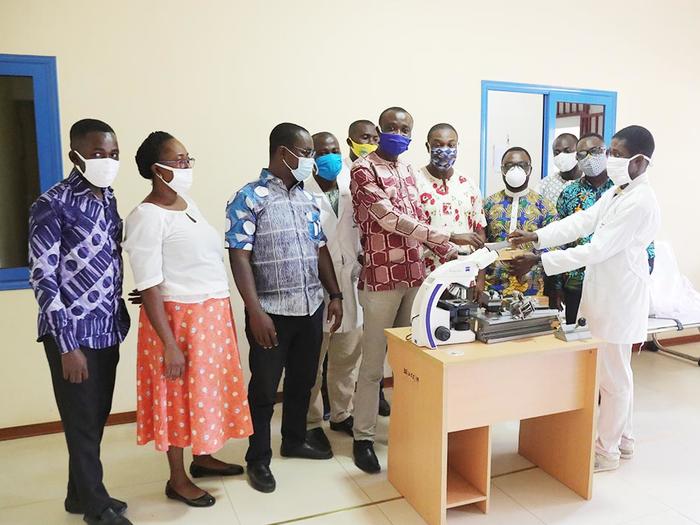 Dr. David Larbi Simpong donating the equipment to the Provost