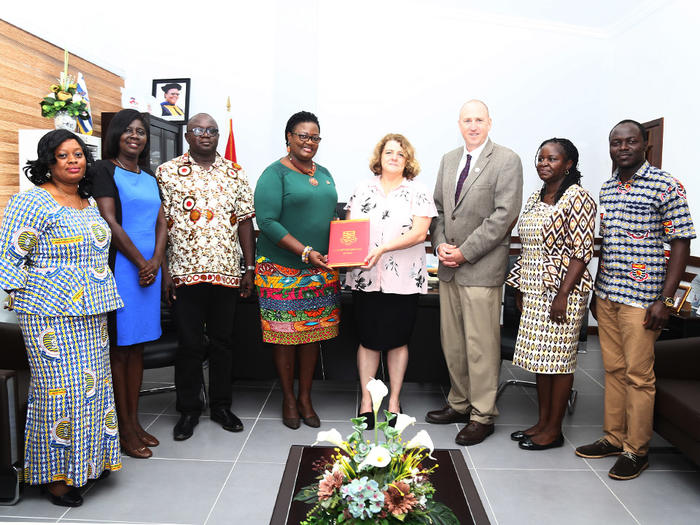 Prof. Dora Edu-Buandoh with the officials from Michigan State University