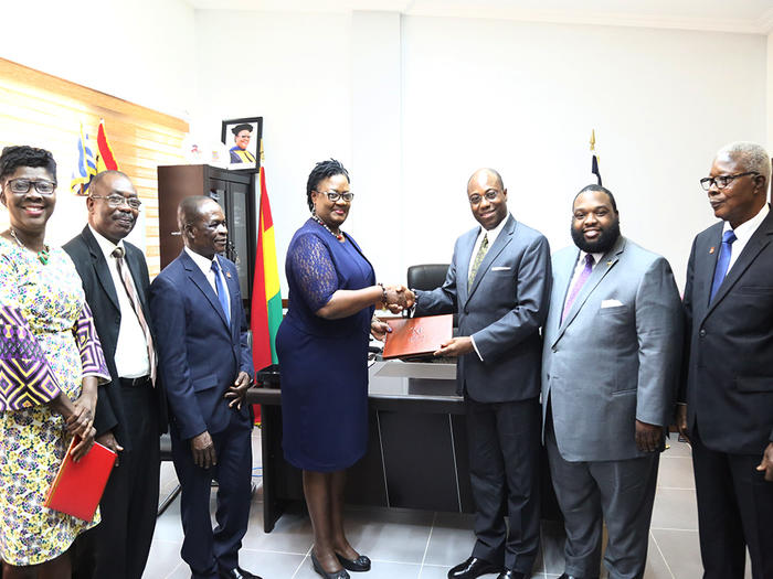 Presentation of UCC souvenir to Dr. Wubah Presentation of UCC souvenir to Dr. Wubah