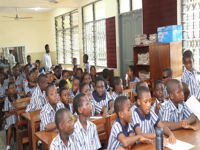 Pupils of the University Primary School listening to the presentation