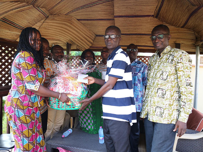 Presentation to former Registrar, Dr. Isaac Ohene at his residence