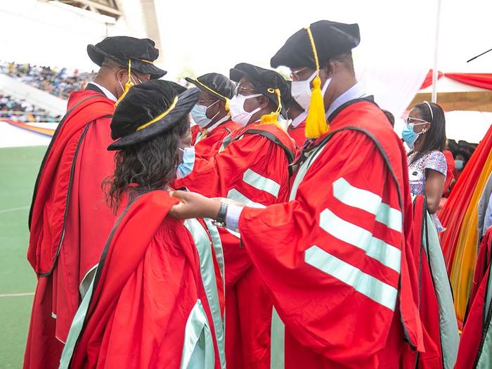 PhD Graduates being robed at the Congregation