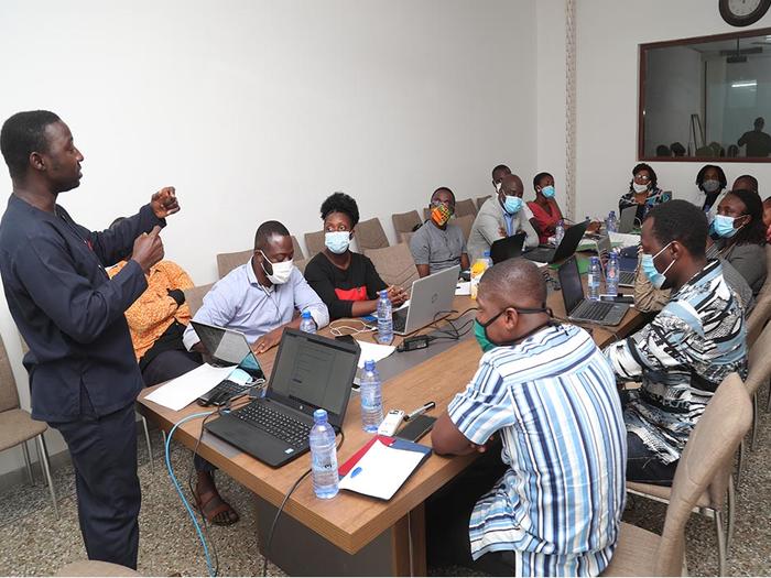 Mr. Isaac Nketsiah giving a presentation at the workshop