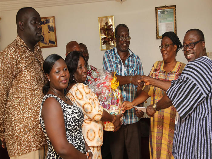 The team presenting a hamper to Mr. Daniel Turkson, formerly of the Documentation and Information Section