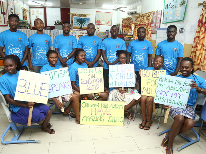 Volunteers of CCDRR displaying placards Volunteers of CCDRR displaying placards